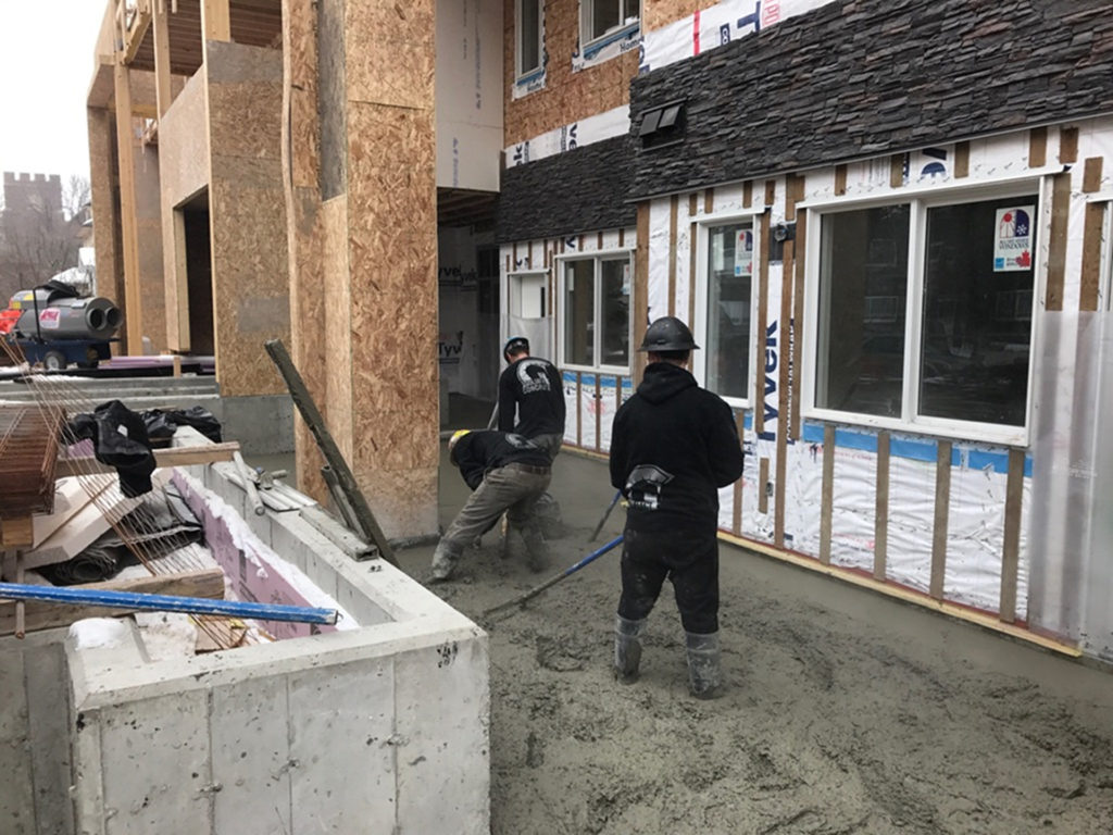 Appartment Building Concrete Supply, Pour, Place, and Finish for Sidwalks, Ramps, and Parkade Ramps